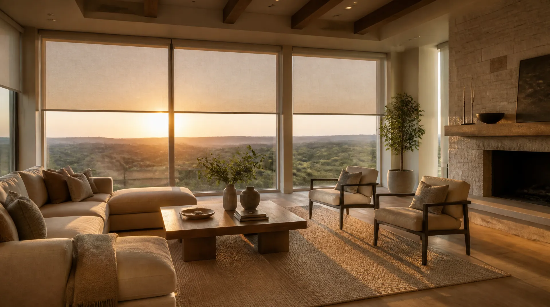 Motorized roller shades half-lowered across tall windows in a bright modern living room.